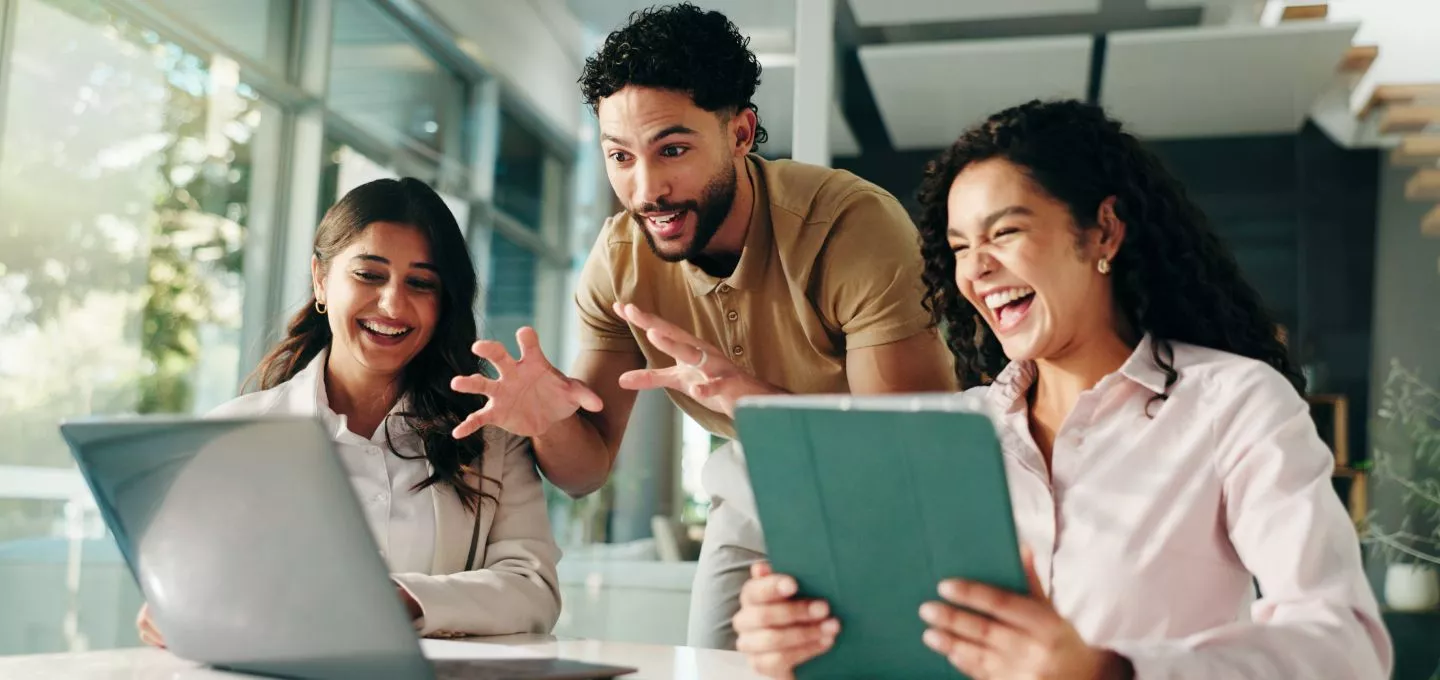 Working on a desk with papers and tablet
