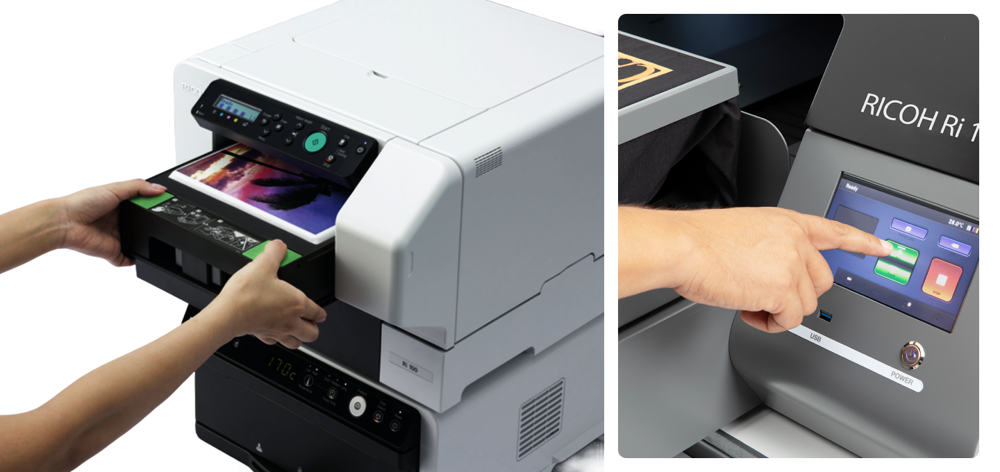 A side-by-side image showing the operation of a Ricoh direct-to-garment printer. On the left, a person's hands slide a tray containing a t-shirt with a colorful cosmic design into the printer. On the right, a close-up shows a hand pressing a button on the machine's touchscreen control panel.
